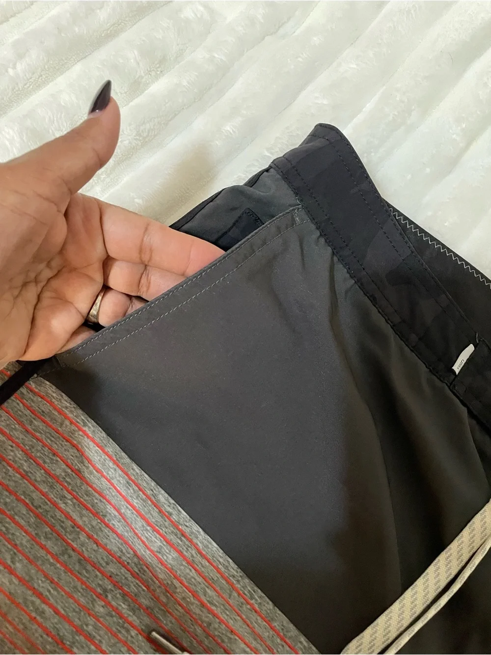 Vuori Men's Swim Shorts in Black with Dusty Rose Accent